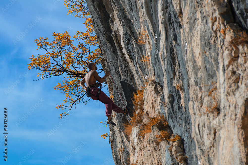 Extreme autumn,rock climbing,on the mountain Extreme autumn,rock climbing,on the mountain