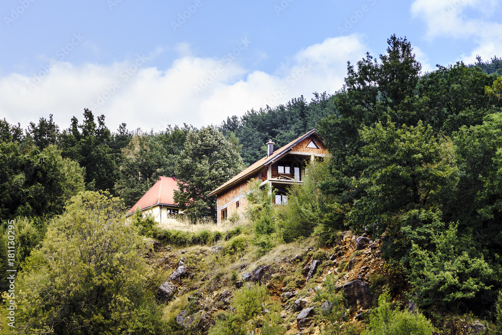 house in the mountains among the forest