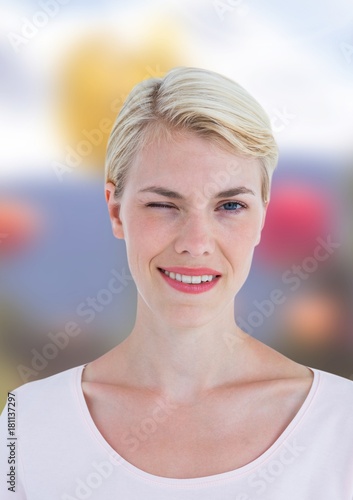 Woman's face in colorful background