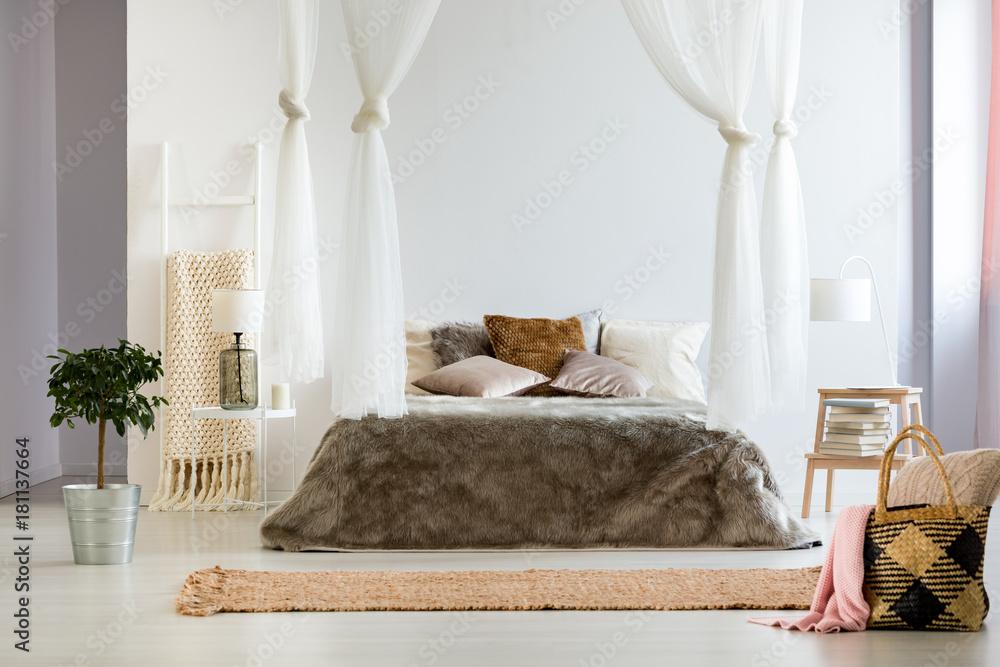 Fototapeta Bedroom with oversized bed blanket