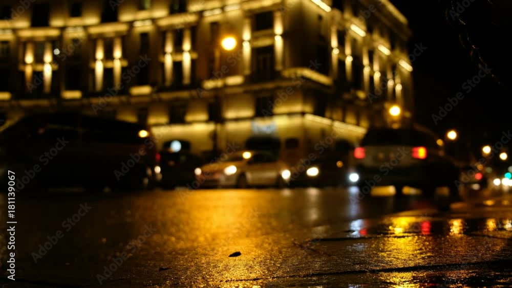 Rainy night in the big city, the car traveling on the highway and shines a blinding light. Rainy night in the big city, the car traveling on the highway and shines a blinding light.