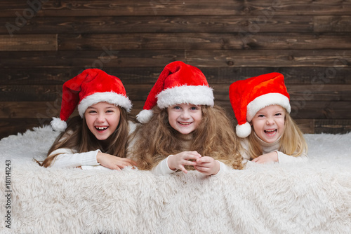  cute happy children with santa hats