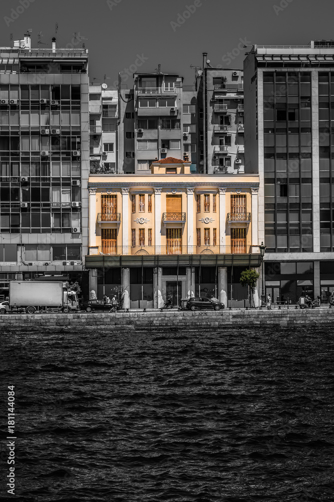 Naklejka premium Old and New... Beautiful Hundred Years Old Building Among New Ones, at Thessaloniki City,