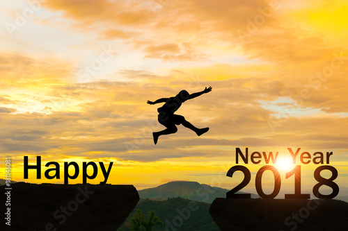 Men jump over silhouette Happy New Year 2018 © sompong_tom
