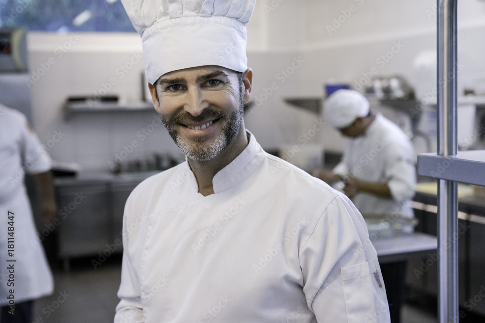 Chef in commercial kitchen, portrait Chef in commercial kitchen, portrait