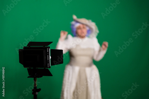 The actress shot on green background. Lighting equipment in the Studio. © Andrey Lapshin
