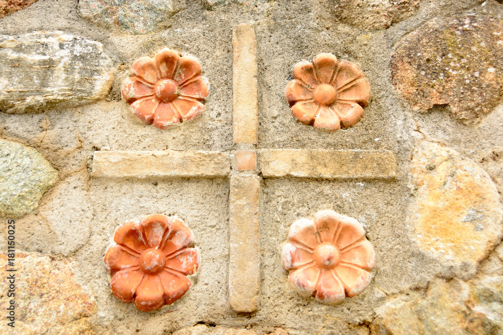 Meteora region in Greece , cross on the wall Meteora region in Greece , cross on the wall