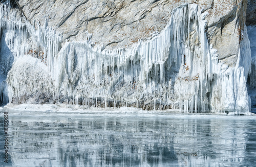 icicles and ice outgrowths on the rock of lake Baikal