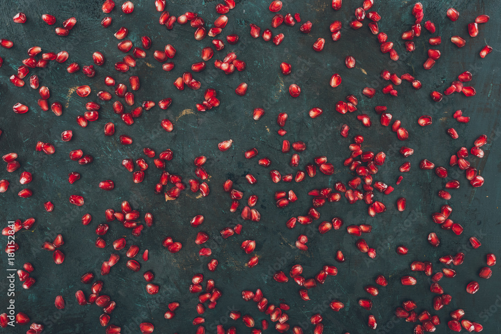 scattered pomegranate seeds