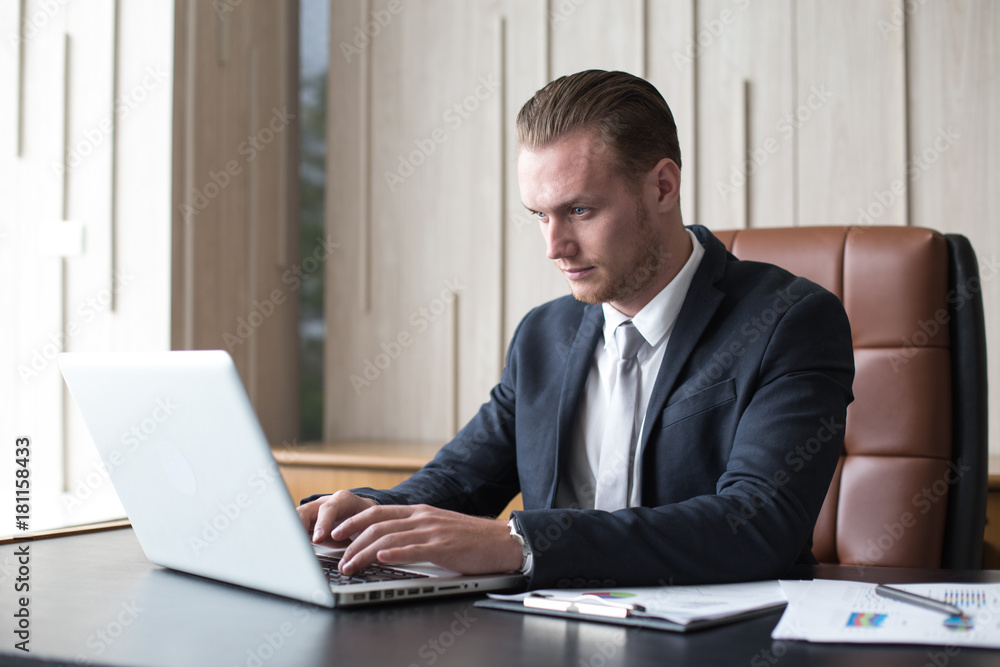 Businessman working with serious emotion at office. Businessman have a busy time. Man working Concept Businessman working with serious emotion at office. Businessman have a busy time. Man working Concept