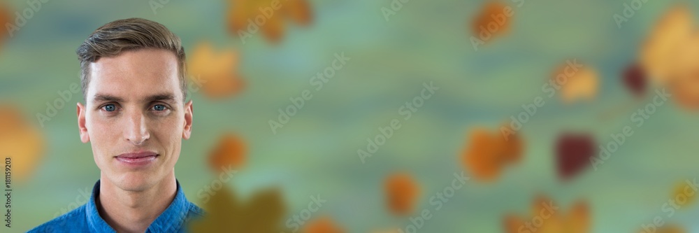 Fototapeta premium Man's face in forest with leaves
