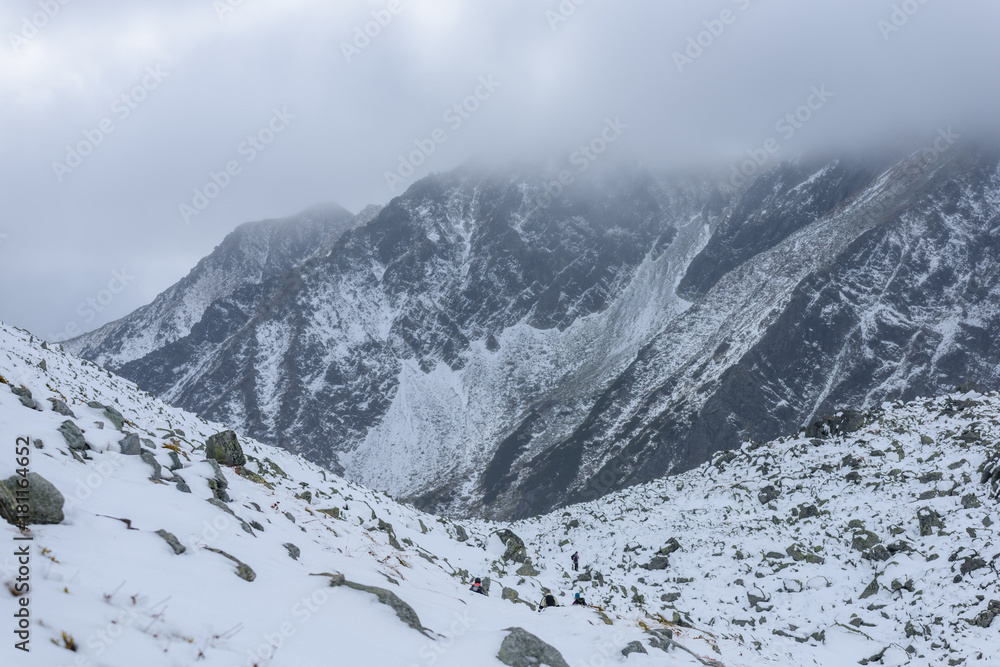 mountain tops in winter covered in snow mountain tops in winter covered in snow
