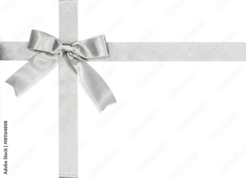 Silver bow satin ribbon isolated on white background with clipping path for gift box wrap and holiday card design decoration element Silver bow satin ribbon isolated on white background with clipping path for gift box wrap and holiday card design decoration element