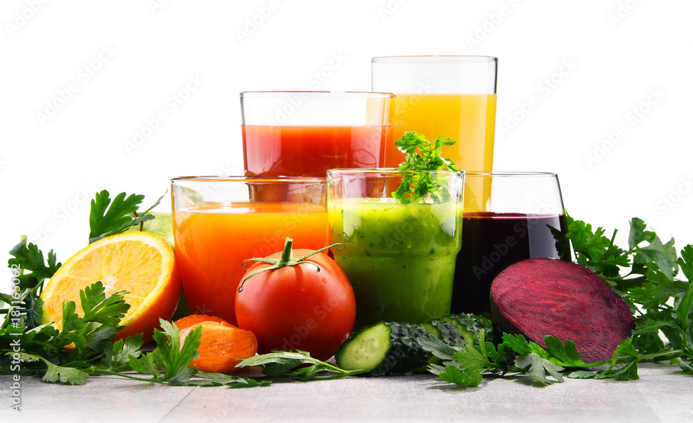 Glasses with fresh organic vegetable and fruit juices Glasses with fresh organic vegetable and fruit juices