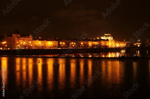 Prague at night , panoramic night view from Charles bridge to the illuminated national theatre © Lars Gieger