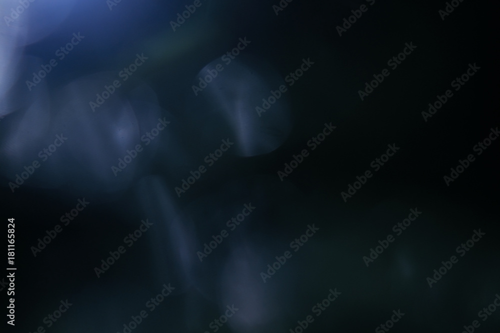 Real Lens flare light effect. Sparkle ray leak on black background. Optical effect of spotlight. Flash leak beam. Real Lens flare light effect. Sparkle ray leak on black background. Optical effect of spotlight. Flash leak beam.