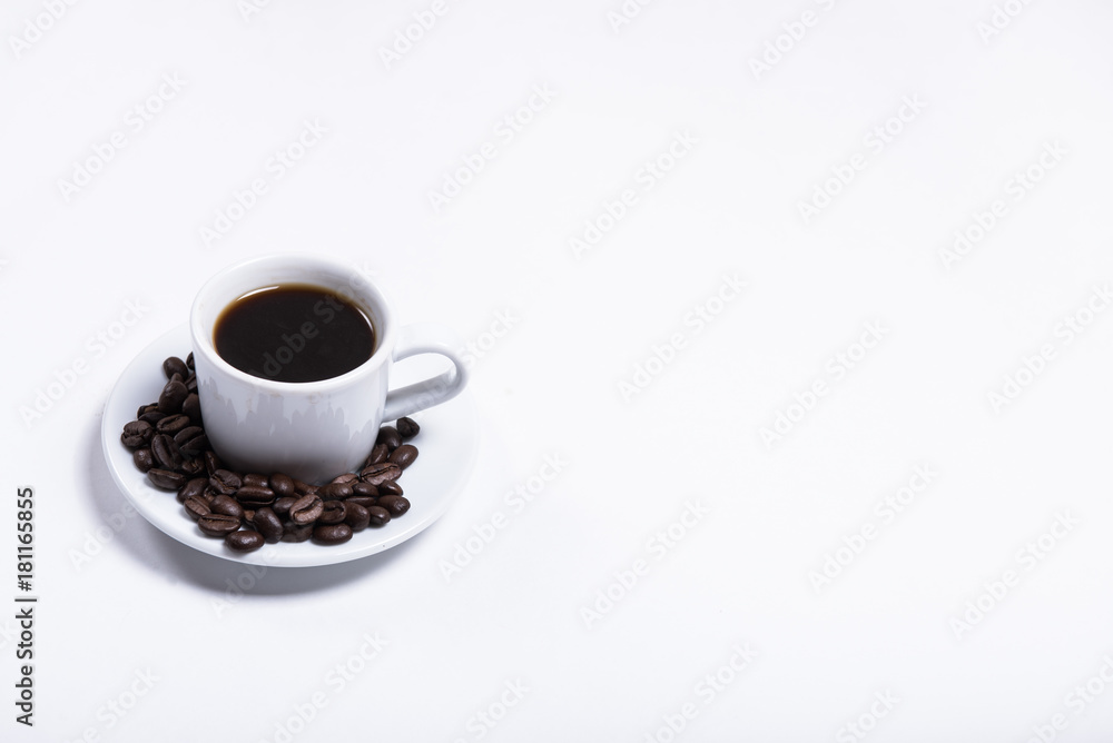 cup of coffee on a white background, scattered coffee beans, heart made of coffee beans, morning coffee at home cup of coffee on a white background, scattered coffee beans, heart made of coffee beans, morning coffee at home