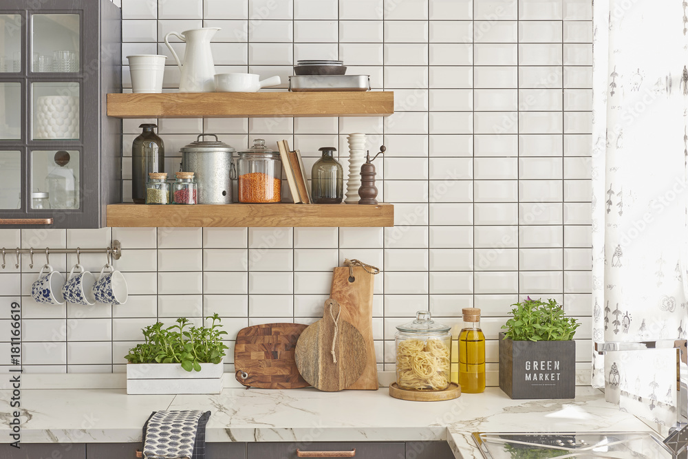 modern designed kitchen with kitchen cupboard and all kind of kitchen  ornaments Stock Photo | Adobe Stock