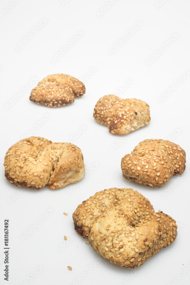 cookies with sesame seeds on a white background cookies with sesame seeds on a white background