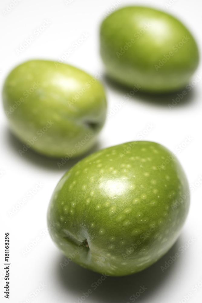 Freshly harvested olives on white background from Sicily Freshly harvested olives on white background from Sicily