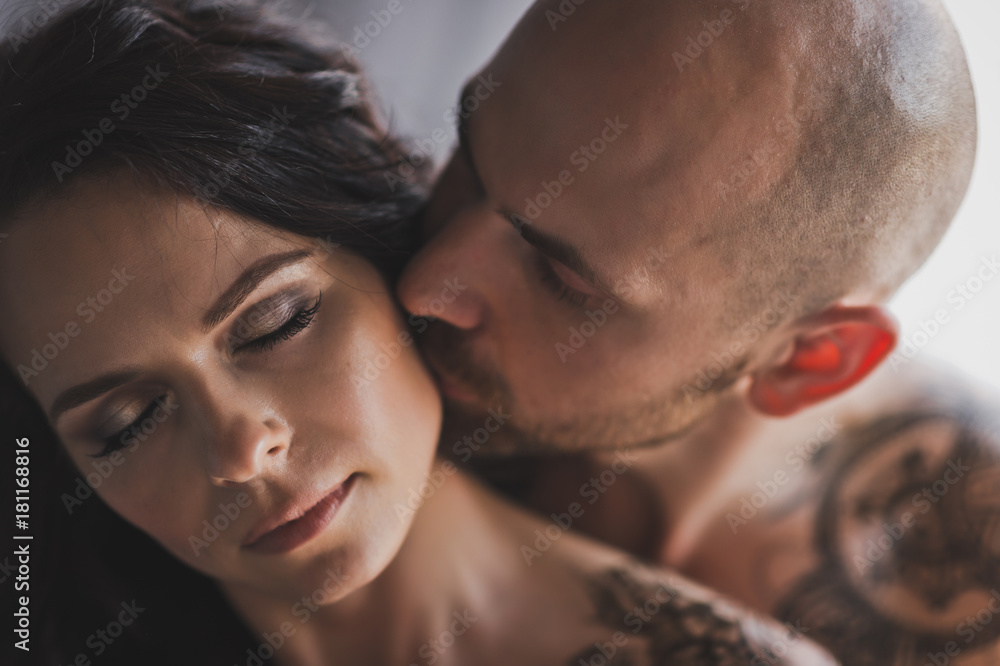 Close-up portrait of cheek kissing girl men 250. Close-up portrait of cheek kissing girl men 250.