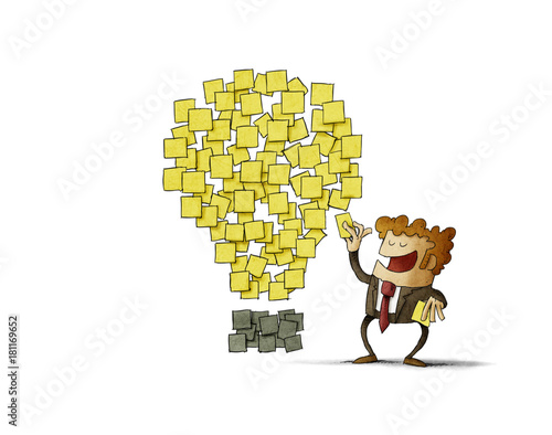 businessman sticks a post note next to others that are shaped like an idea. creativity concept. isolated