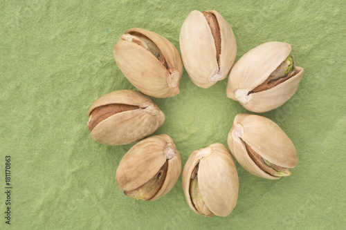 Wallpaper Mural Sicilian pistachio on green background Torontodigital.ca