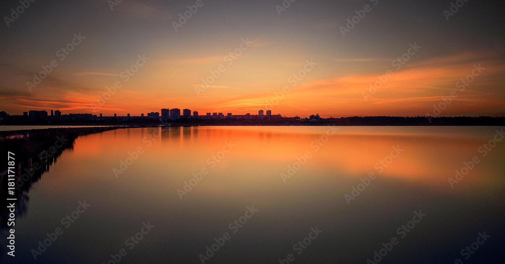 sunset,water,lake,sky,sun,landscape,sunrise.dusk,reflection,river,night,evening,clouds,beach,sea,orange,silhouette,city