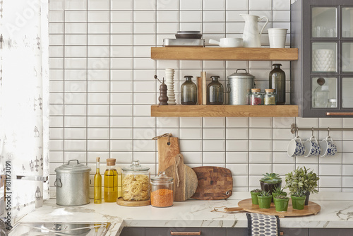 white kitchen corner kitchen countertops wooden shelf and grey cupboard kitchen ornaments style interior concept