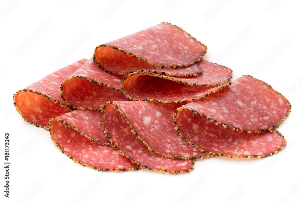 Salami slices isolated on the white background.