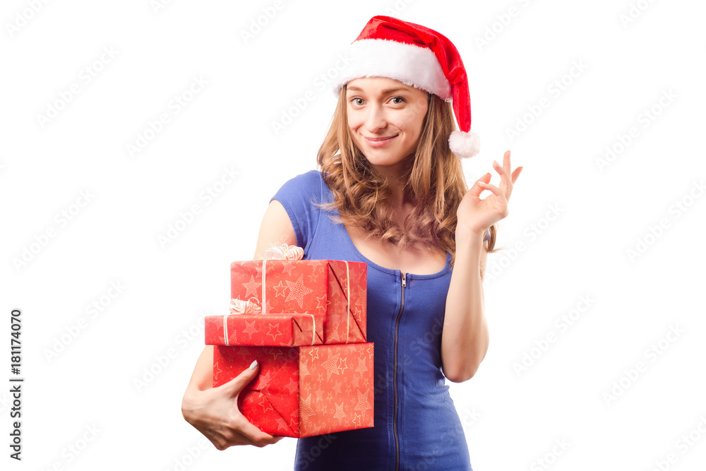 Young beautiful woman in hands holding a new year christmas holiday gift Young beautiful woman in hands holding a new year christmas holiday gift