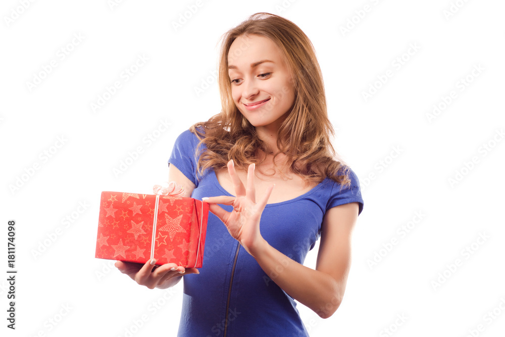 Young beautiful woman in hands holding a holiday gift Young beautiful woman in hands holding a holiday gift