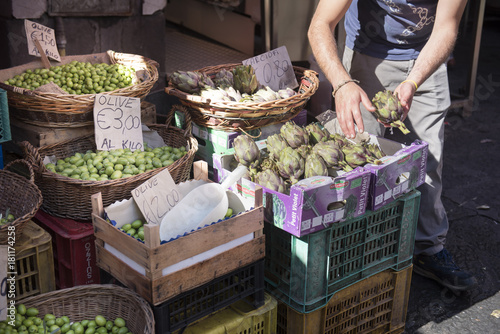 Fototapeta Naklejka Na Ścianę i Meble -  Artichokes and olives at fish market Catania Sicily
