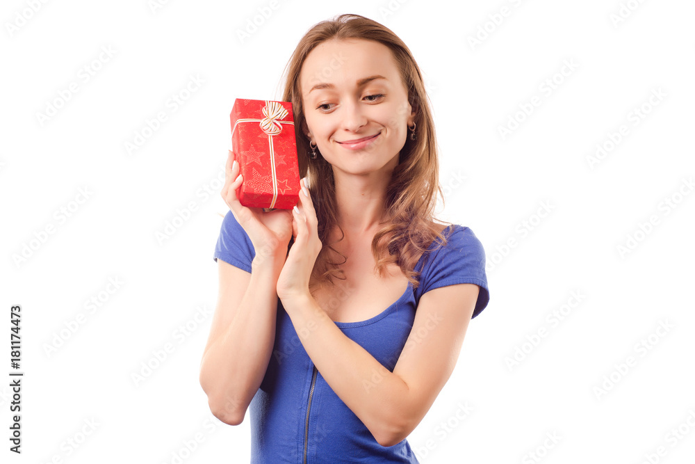 Young beautiful woman in hands holding a holiday gift Young beautiful woman in hands holding a holiday gift