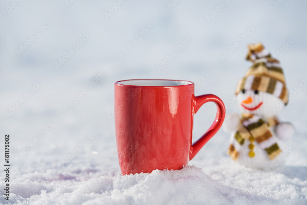 Fototapeta premium Snowman and red hot cup of tea