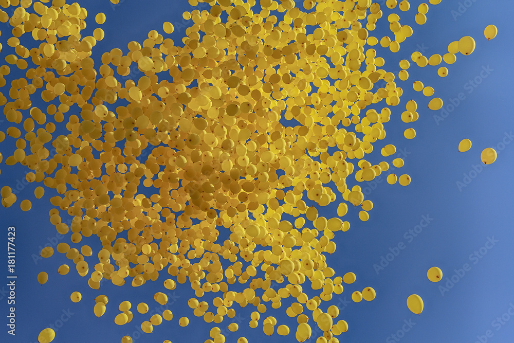 Yellow balls fly against the sky. Festival Yellow balls fly against the sky. Festival