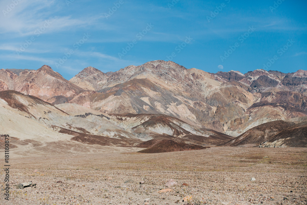 View of mountain range against blue sky View of mountain range against blue sky