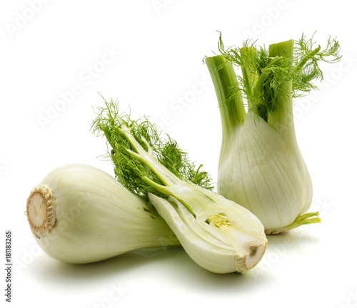 Florence fennel isolated on white background two fresh bulb one sliced half.