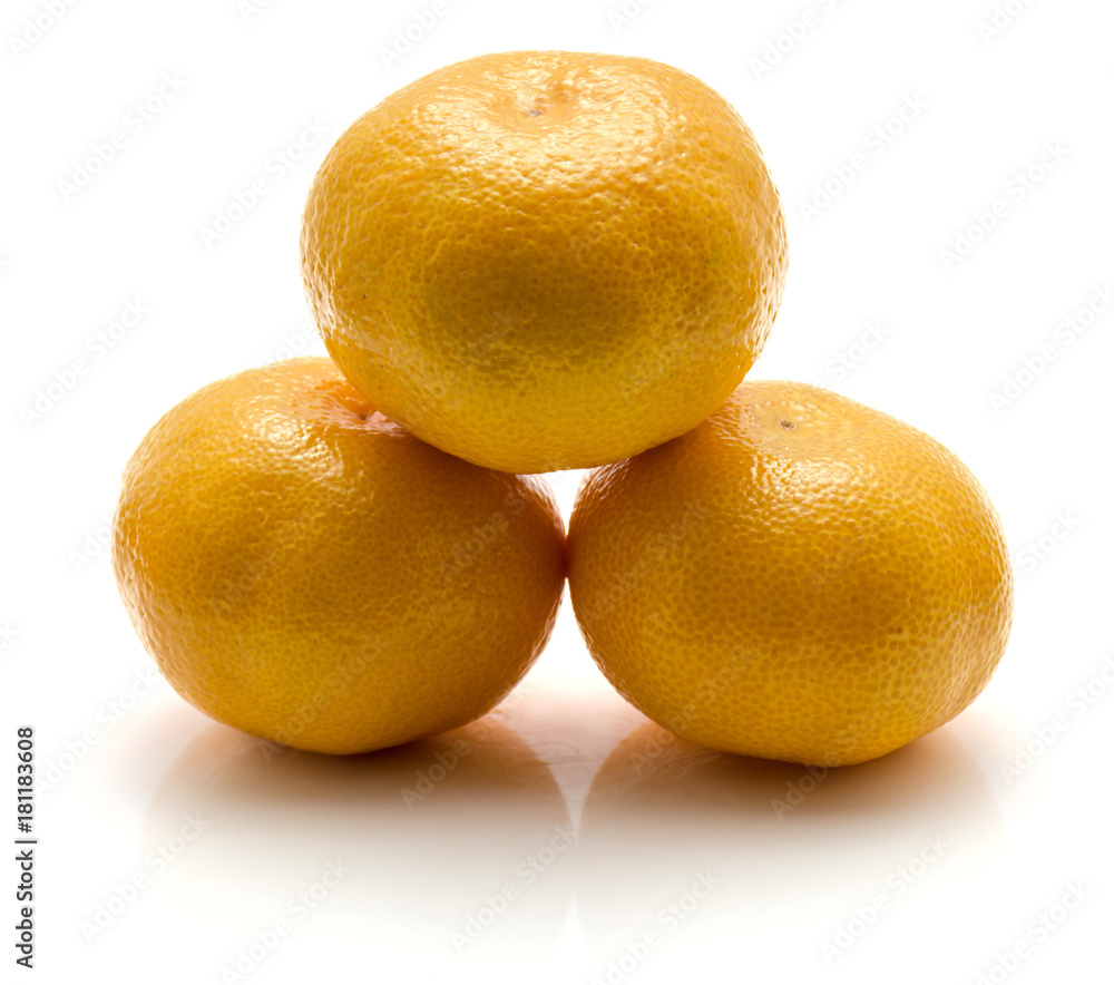 Heap of three tangerines isolated on white background. Heap of three tangerines isolated on white background.