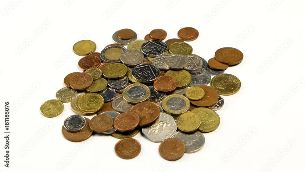 Rotation of different coins on the table Rotation of different coins on the table