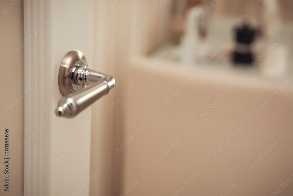 Obraz premium Closeup shot of modern partition door handle. Empty space