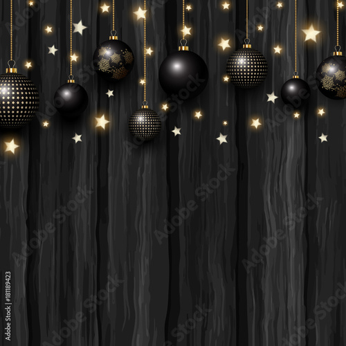 Christmas baubles and stars on a grunge wooden texture