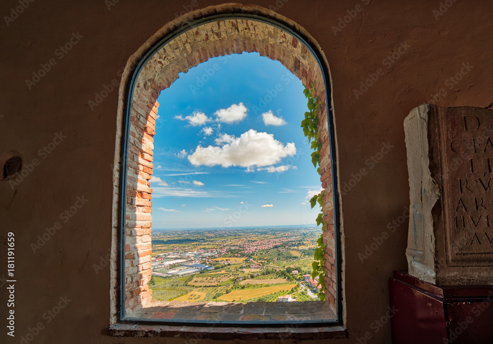 view of Romagna through ancient window