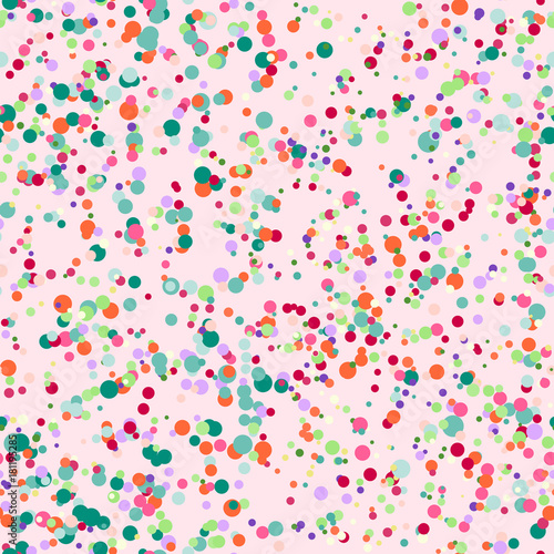 Abstract seamless pattern with colorful blue, yellow, orange, red, chaotic small circles on pink. Infinity messy geometric pattern. Vector illustration. 