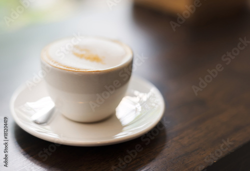 Closeup of hot drink on a wooden table
