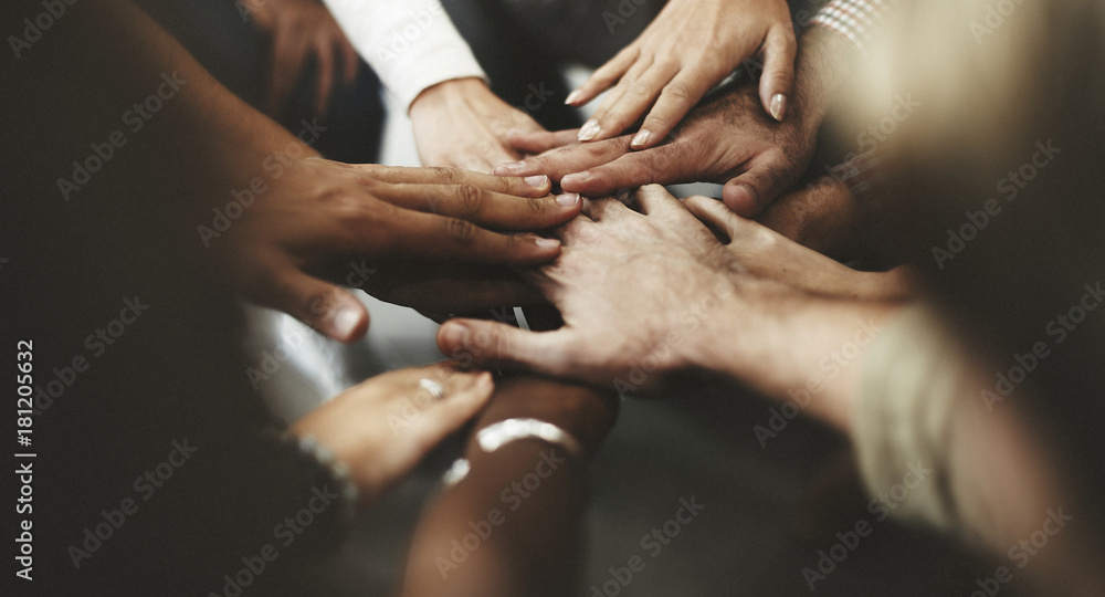 People with joined hands as a team - obrazy, fototapety, plakaty 