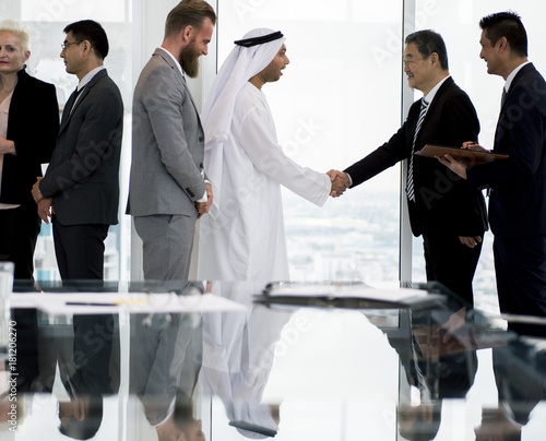 Business Partners Introductionary Handshake Bow photo