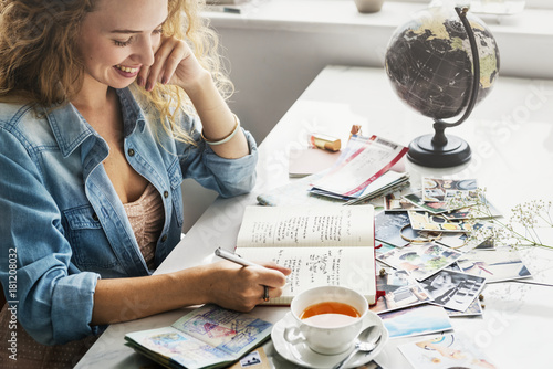 Woman Writing Diary Travel Journey Photos Concept