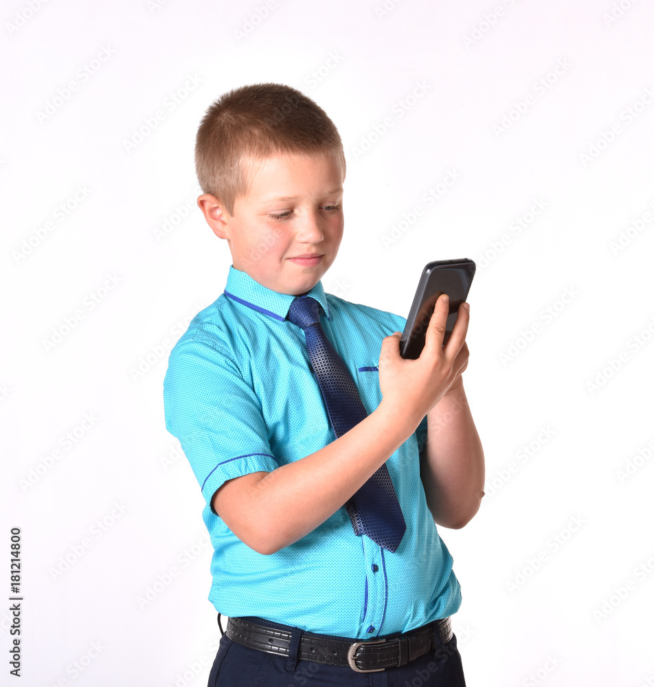 Isolated guy. Business people. A young businessman. The boy has a phone in his hands. Isolated guy. Business people. A young businessman. The boy has a phone in his hands.