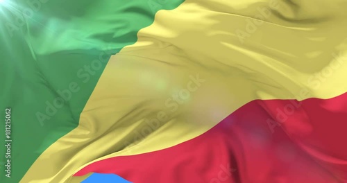 Congolese flag waving at wind with blue sky in slow, loop photo